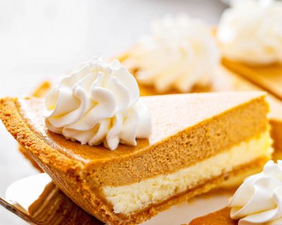 Pumpkin PIe Cheesecake slice on a sliver pie server.