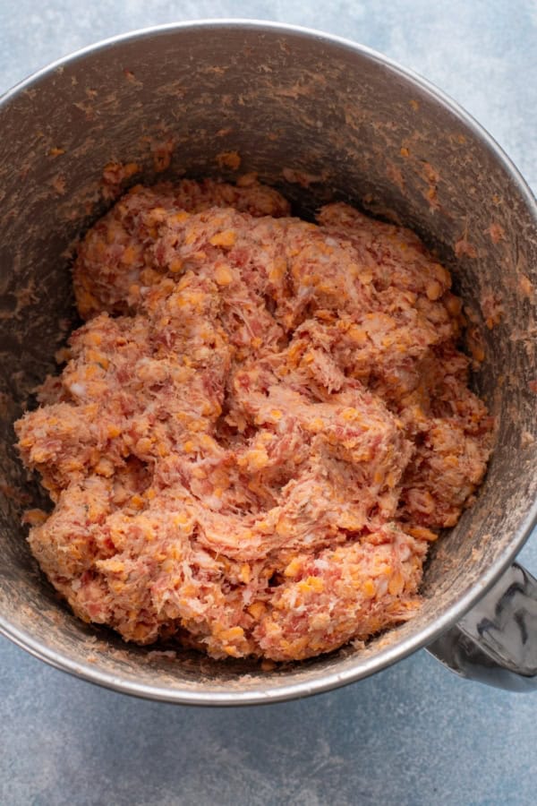 Sausage ball mixture combined in a mixing bowl.