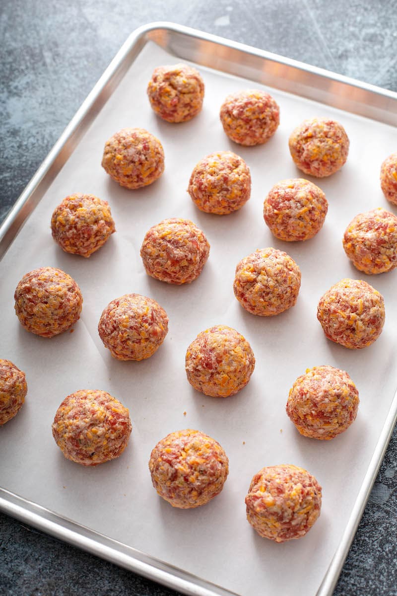 Bisquick Sausage Balls before baking on a cookie sheet.