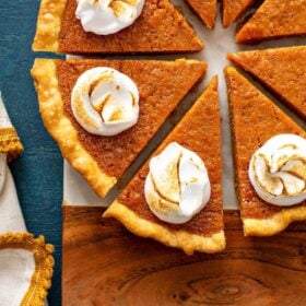 Sweet Potato Pie sliced with marshmallow icing.