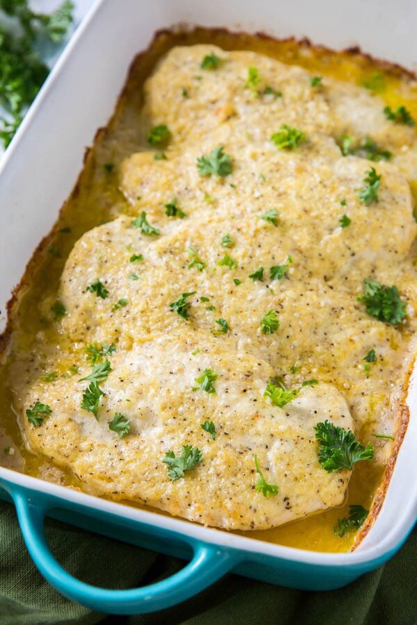 Creamy Parmesan Chicken in casserole baking dish.