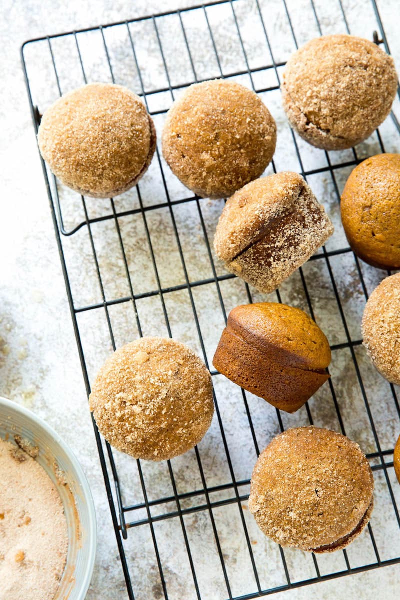 Donut Pumpkin Muffins on a cooling rack.