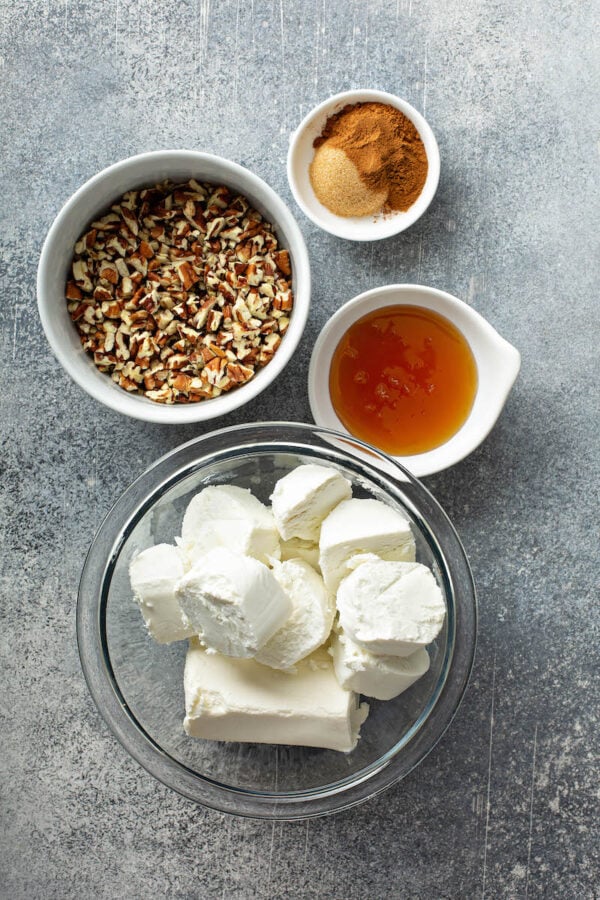 Honey Pecan Cheese Truffles Ingredients in white bowls.