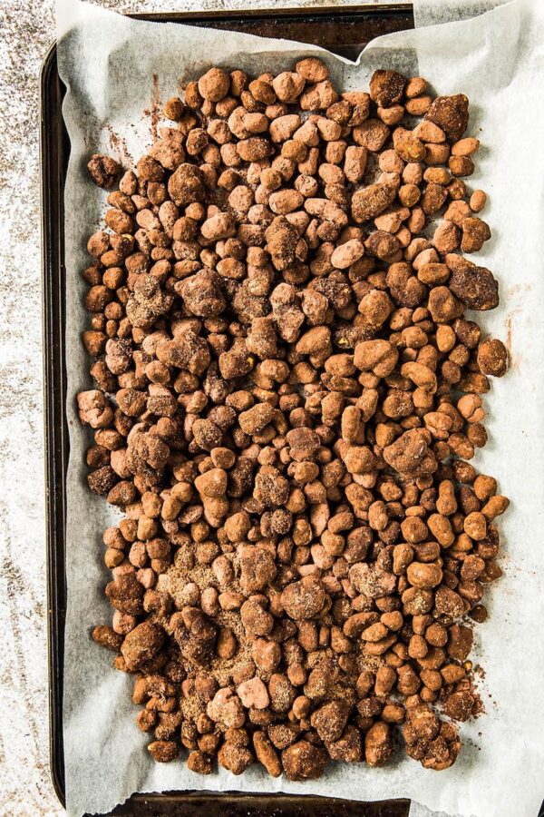 Reindeer Poop on parchment paper on a cookie sheet.