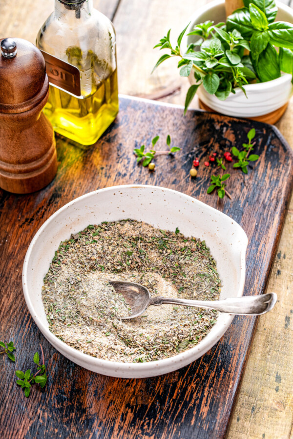 Shallow bowl of mixed spices and herbs.