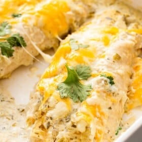 Sour cream chicken enchilada recipe in a large casserole dish.