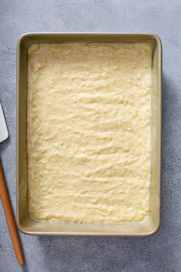 Orange Coconut Cake in a baking pan before baking.