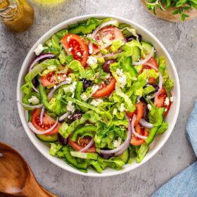 Overhead view of a bowl filled with homemade greek salad.