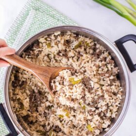 Dirty rice is a classic Cajun rice dish loaded with flavor from Cajun seasonings, ground meat and the holy trinity of onions, celery and bell peppers! #DirtyRice #DirtyRiceRecipe #RiceRecipes #Rice #CajunRecipes #CajunFood #GroundMeatRecipes #GroundBeefRecipes #CreoleRecipes #CajunRice