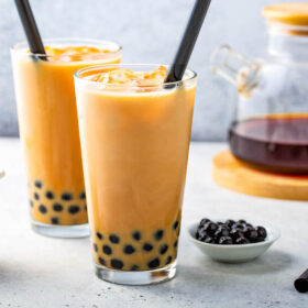 Boba Tea in a glass with tapioca pearls.