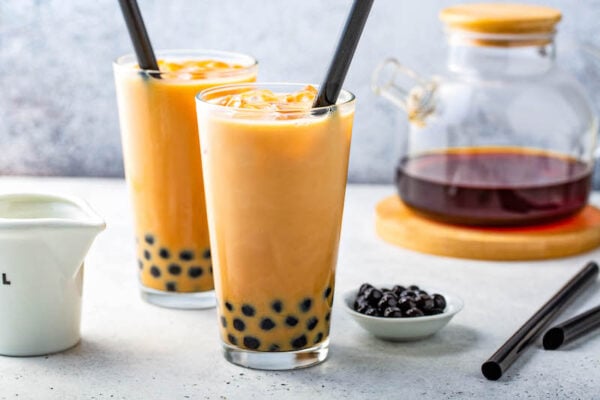 Boba Tea in a glass with tapioca pearls.