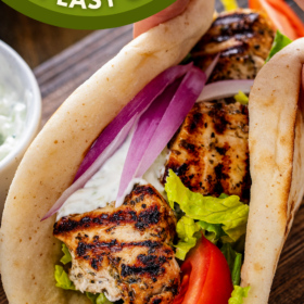 Chicken gyro with fresh vegetables and tzatziki sauce.