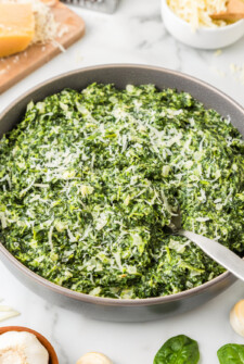 Creamed spinach with more parmesan on top.