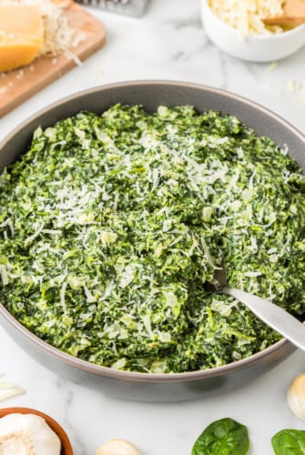 Creamed spinach with more parmesan on top.