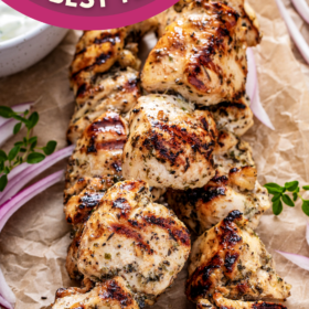 Grilled chicken with Greek seasoning on skewers.