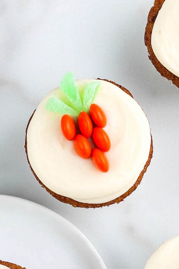 Carrot cake cupcakes with decoration on top. 