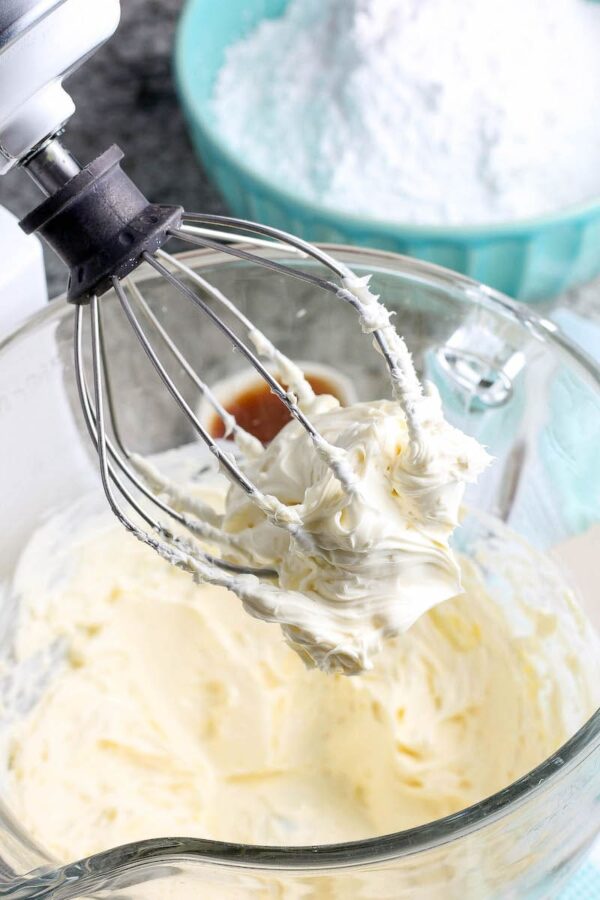 Cream Cheese Frosting in stand mixer being mixed.