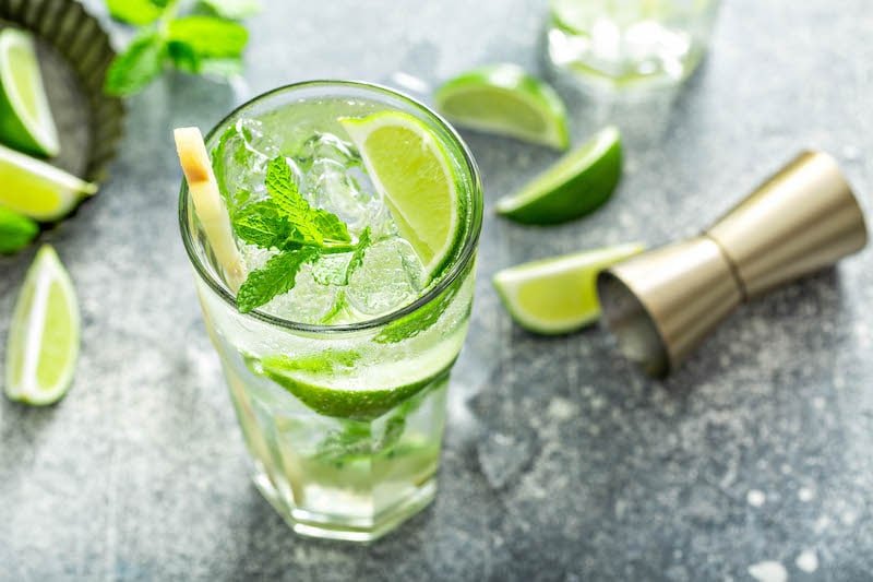 Mojito with lime, mint and sugar cane.