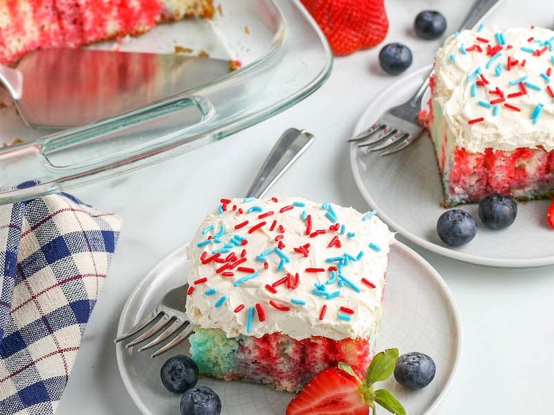 4th of July cake on a plate with sprinkles and fruit