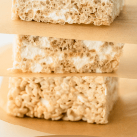 Pinterest Image of brown butter rice krispies treats with writing.