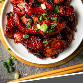 Pinterest Image of Chinese BBQ Pork on a white plate with pinterest writing on it.