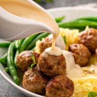 A Dinner Plate with Swedish Meatballs and Cream Sauce