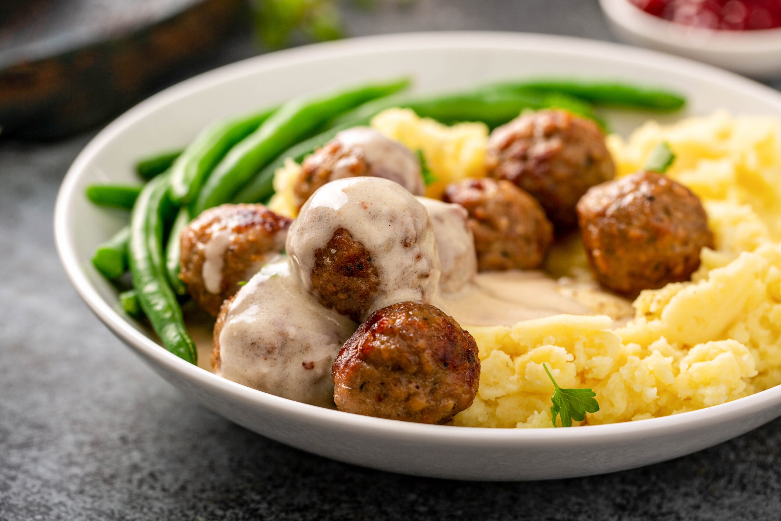 A Plate of Swedish Meatballs, Potatoes and Green Beans
