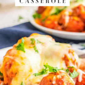 Pinterest College image of meatball sub casserole on a plate with cheese on top.