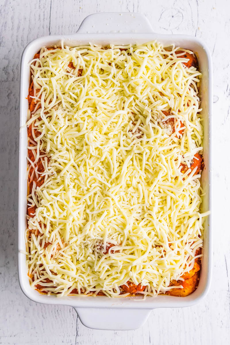 Meatball sub casserole with shredded mozzarella on top.