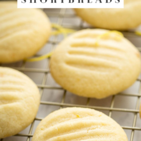 Whipped shortbread cookies on a cooling rack.