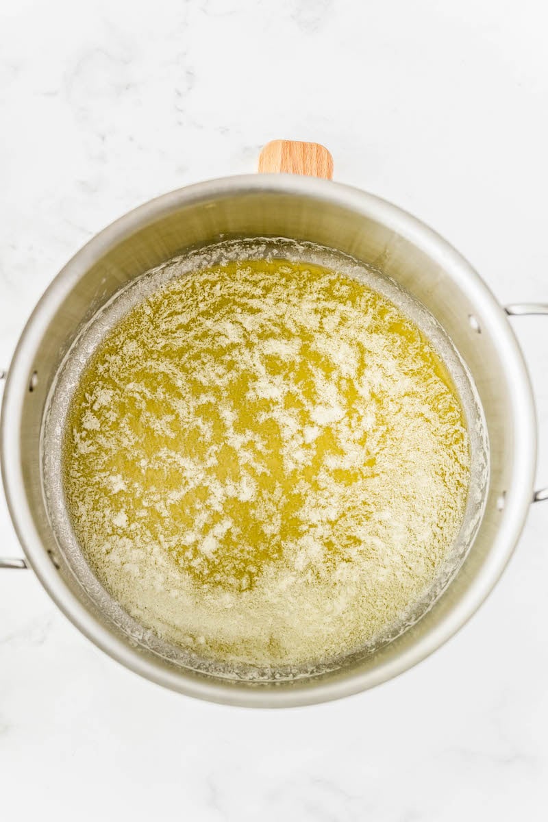 Heavy bottomed pot of melted butter.