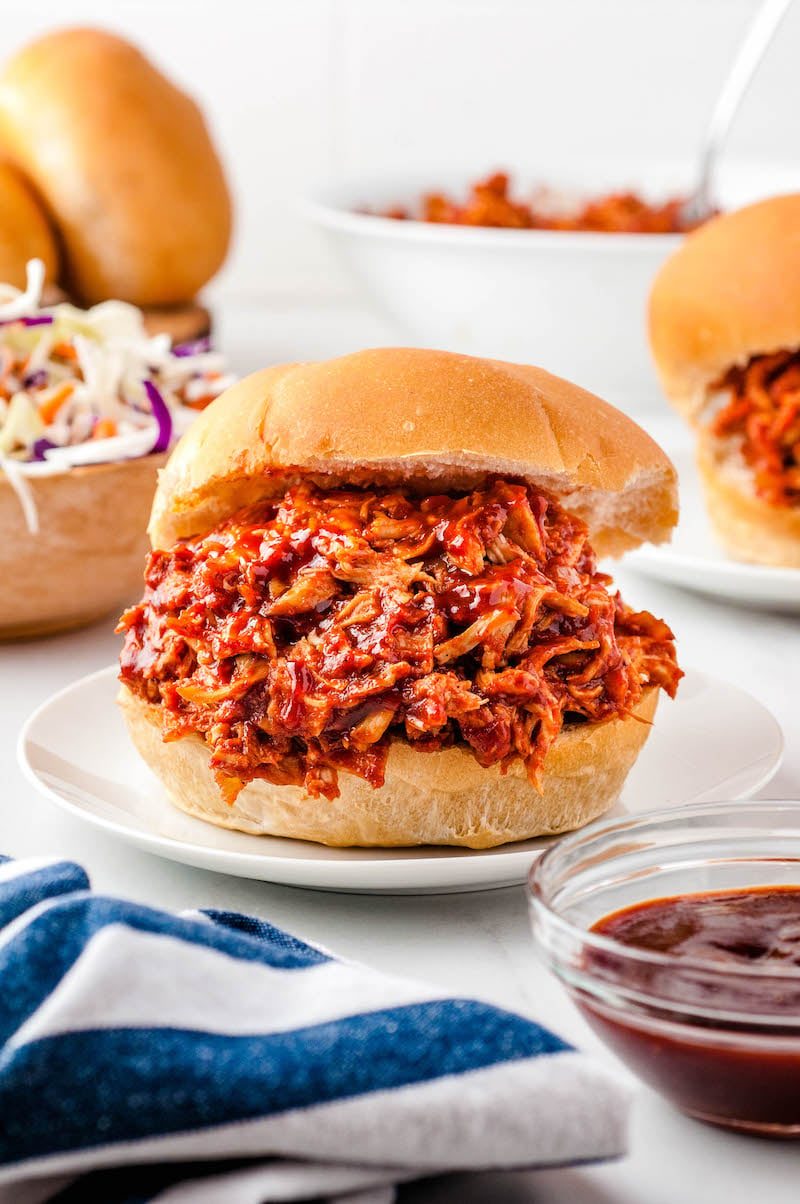 Oven pulled chicken on sandwich buns.