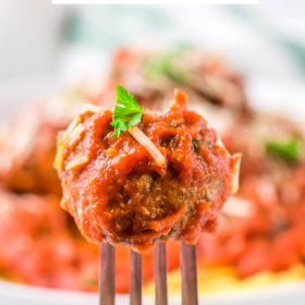 A meatball on a fork.