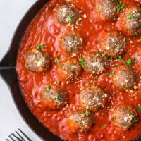 Meatballs and tomato sauce in a pan.