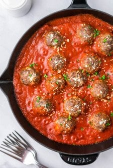 Meatballs and tomato sauce in a pan.