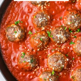 Pinterest pin image of homemade meatballs in sauce in a skillet.