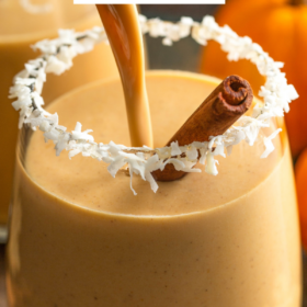 Pinterest image of Pumpkin Coquito being poured into a glass with lettering on top.