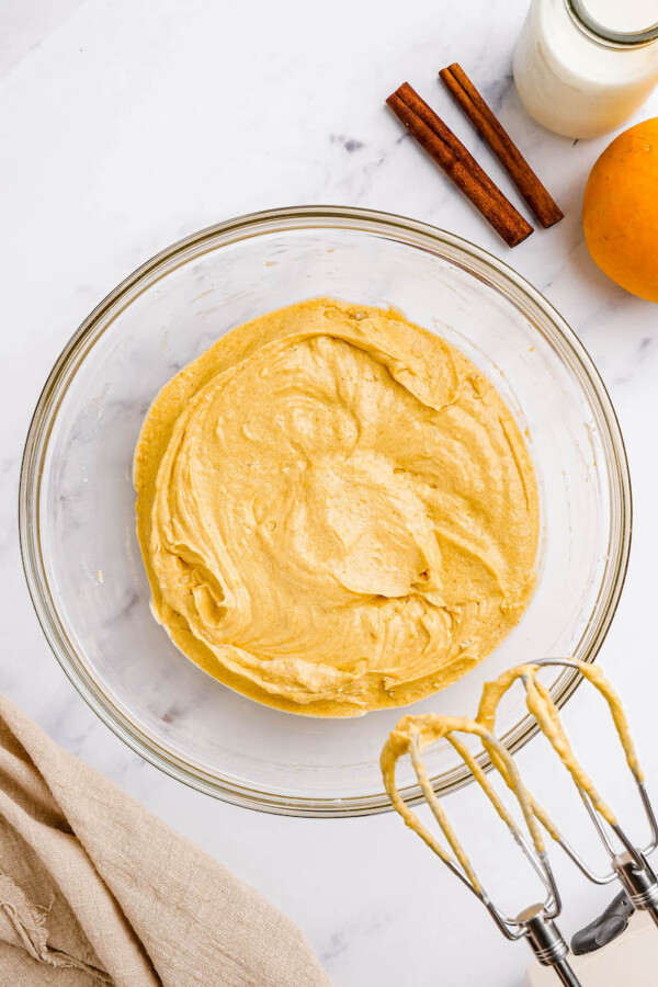 Pumpkin cupcakes batter in a glass bowl.