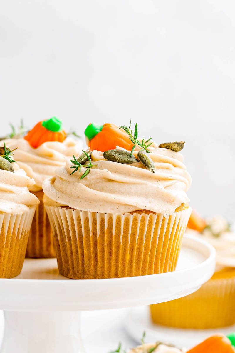 Pumpkin cupcakes with cinnamon cream cheese frosting.