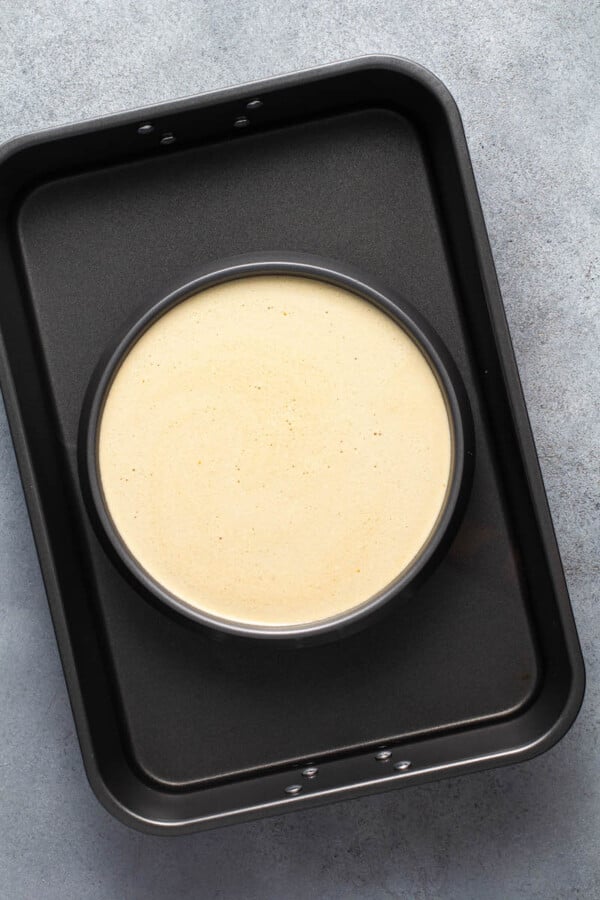 The flan mixture is placed in a pan 