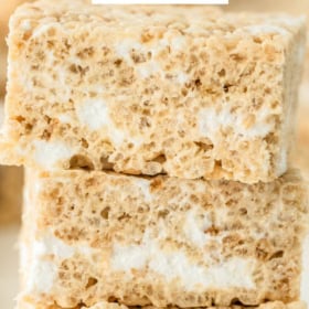 Pinterest image of Rice Krispie treats stacked on top of each other with wording on top.