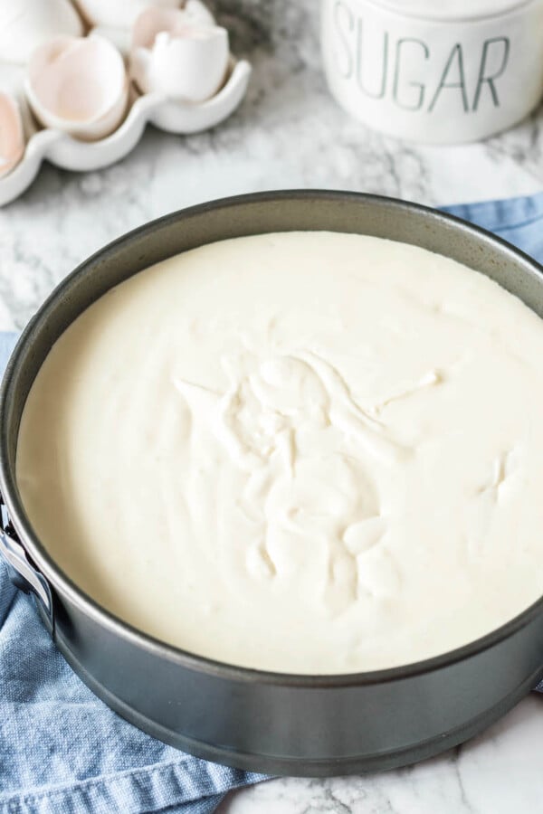 Cheesecake batter in a springform pan.
