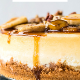 Bananas foster cheesecake on a cake platter.