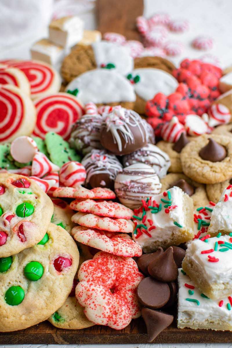 Christmas cookies and sweets on a board.