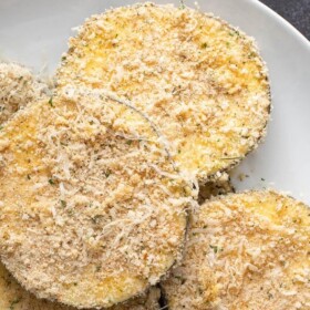 Breaded eggplant slices on a plate