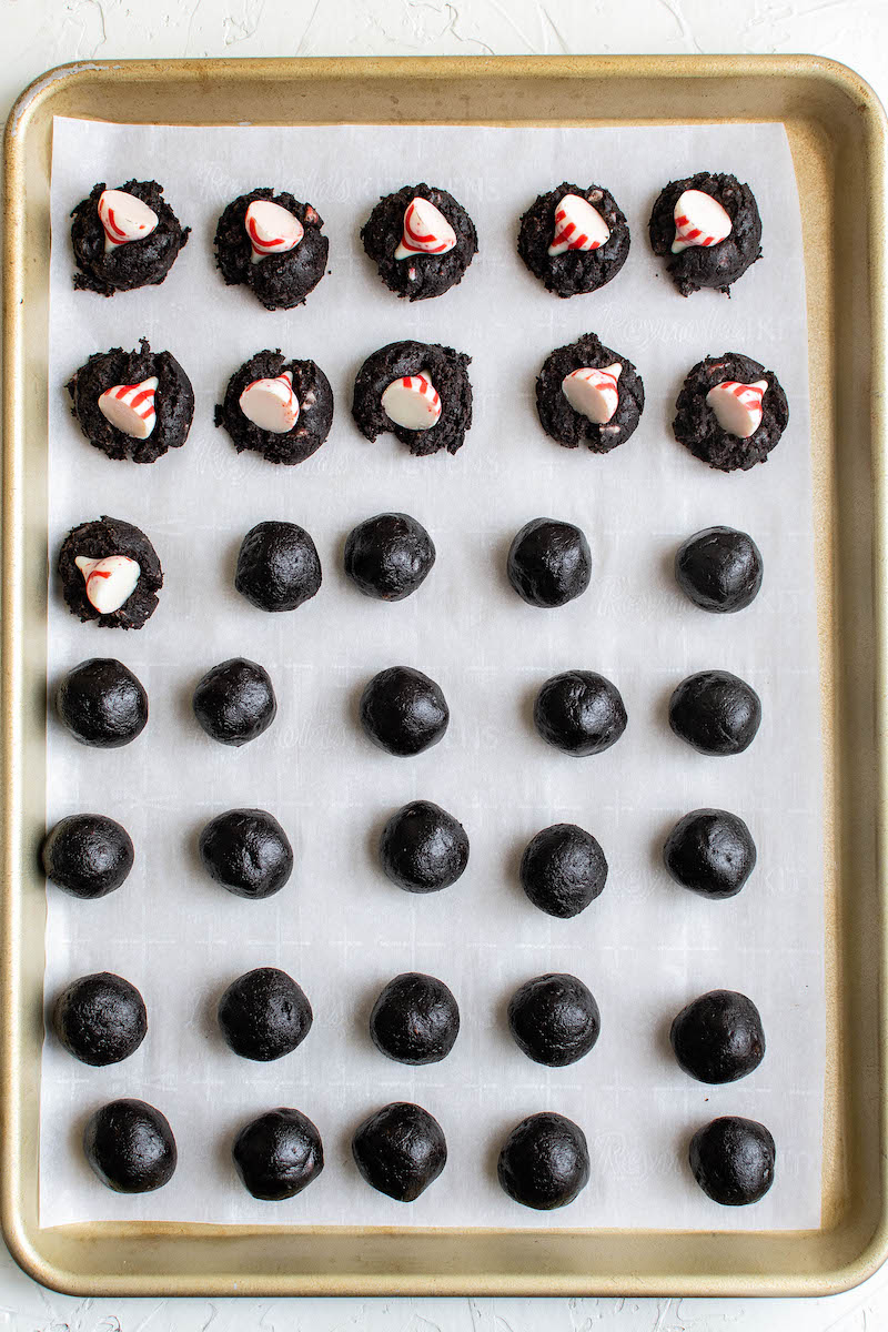 Oreo cookie balls with peppermint Hershey's kisses.