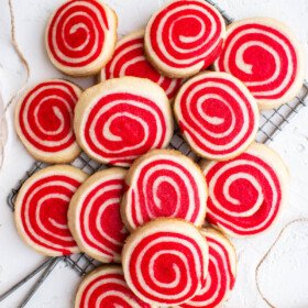 A bunch of red pinwheel cookies.