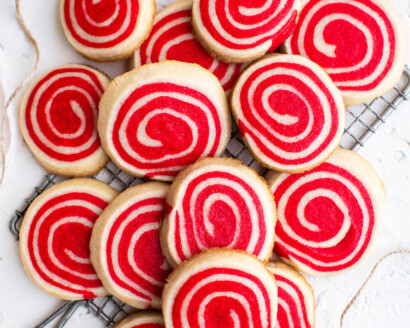 A bunch of red pinwheel cookies.