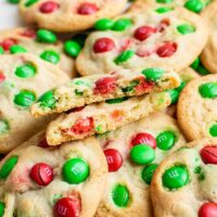 Pile of red and green M&M cookies.