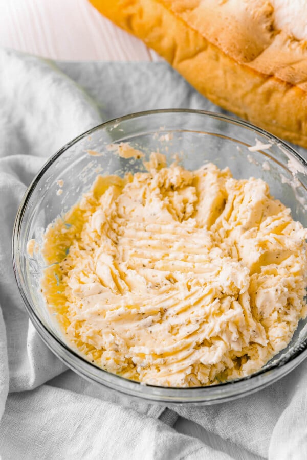 Mixed garlic bread spread in a bowl.